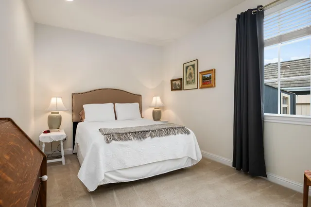 a utility room with sink dryer and washer