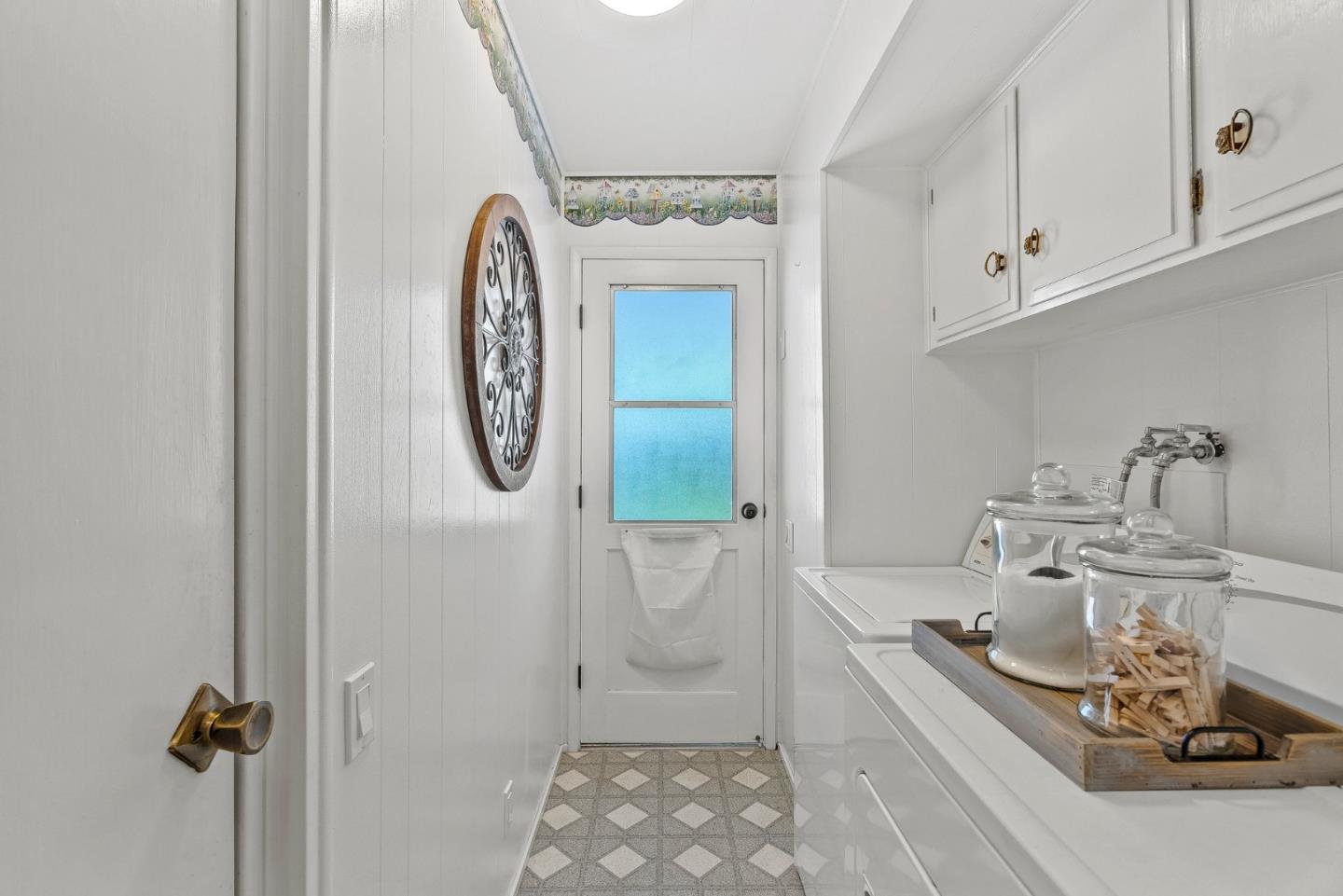 15 Oak Shadows Lane, Unit 15 Aptos, CA 95003 - Photo 12 of 56 a bathroom with a granite countertop sink and a mirror