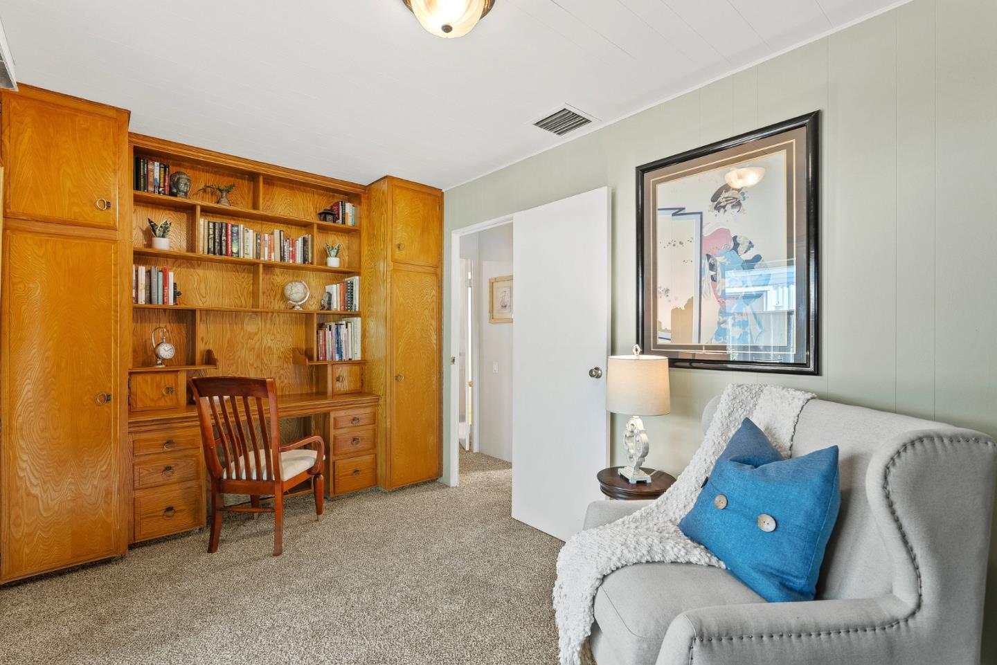 15 Oak Shadows Lane, Unit 15 Aptos, CA 95003 - Photo 13 of 56 a living room with furniture and a window