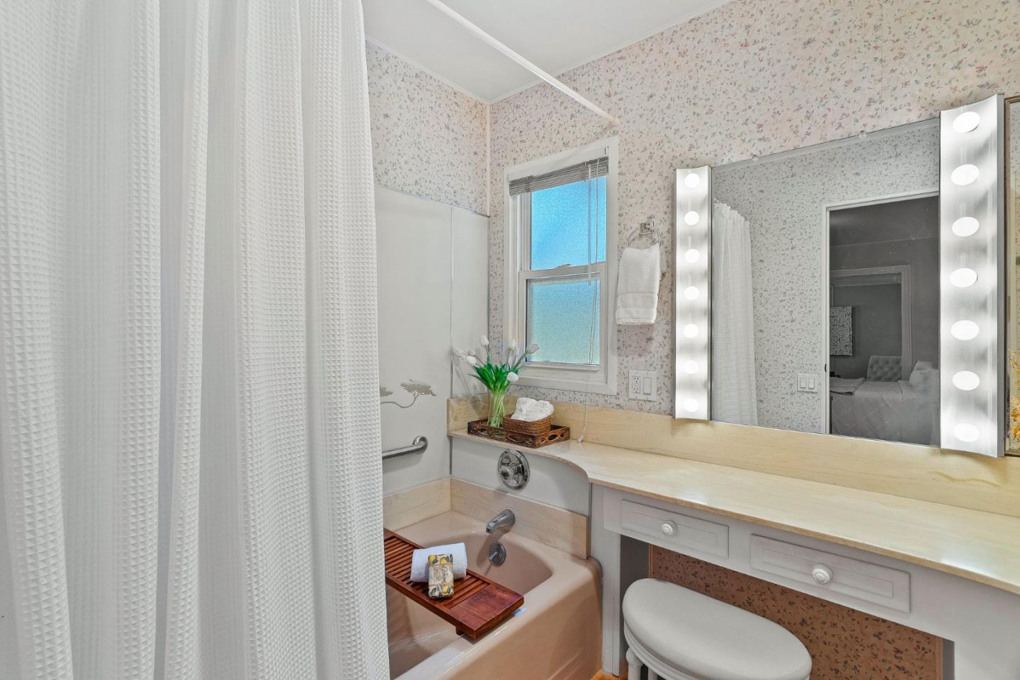 15 Oak Shadows Lane, Unit 15 Aptos, CA 95003 - Photo 19 of 56 a bathroom with a granite countertop sink and a mirror