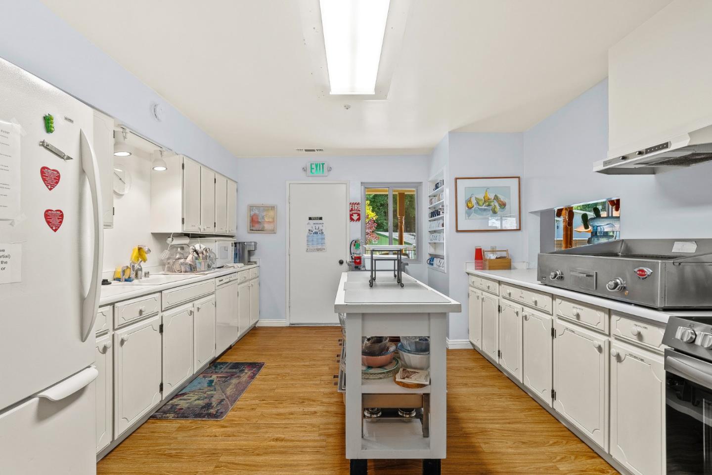 15 Oak Shadows Lane, Unit 15 Aptos, CA 95003 - Photo 33 of 56 a kitchen with cabinets a sink and appliances