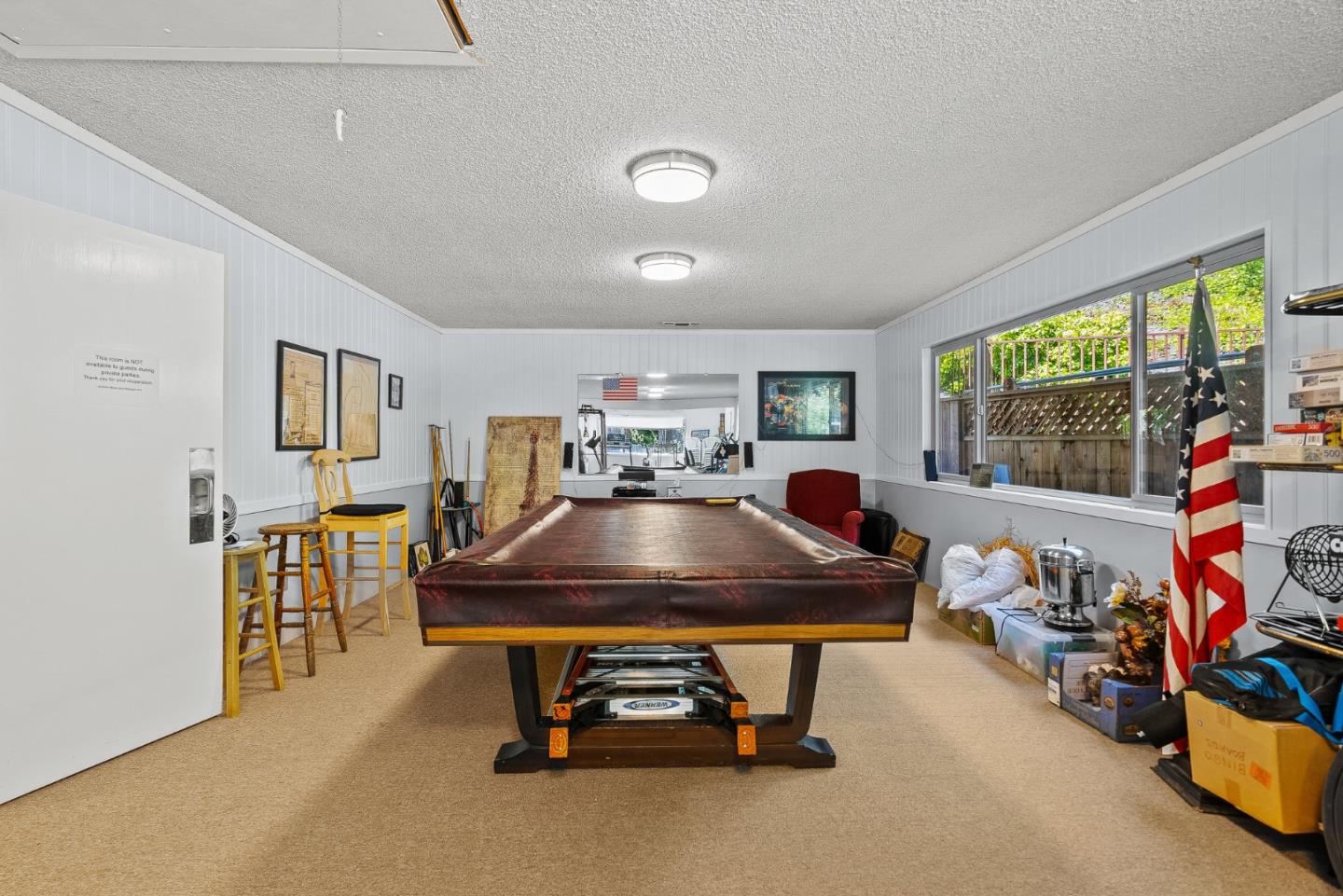 15 Oak Shadows Lane, Unit 15 Aptos, CA 95003 - Photo 34 of 56 a living room with furniture a pool table and a large window