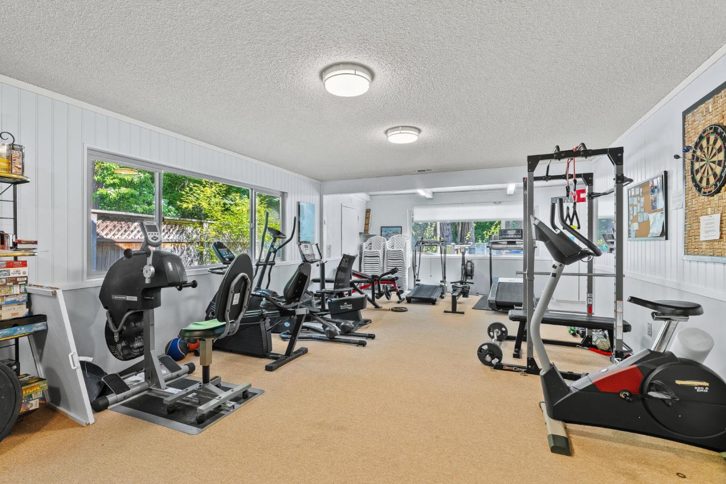15 Oak Shadows Lane, Unit 15 Aptos, CA 95003 - Photo 35 of 56 a view of a room with gym equipment