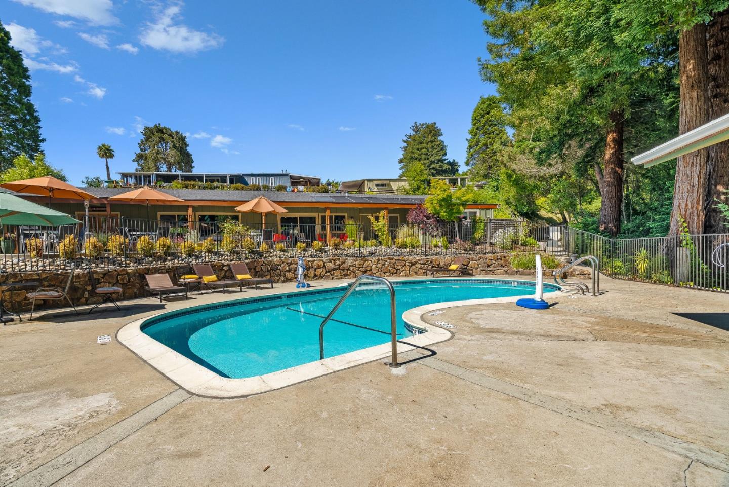 15 Oak Shadows Lane, Unit 15 Aptos, CA 95003 - Photo 37 of 56 a view of a swimming pool with a patio