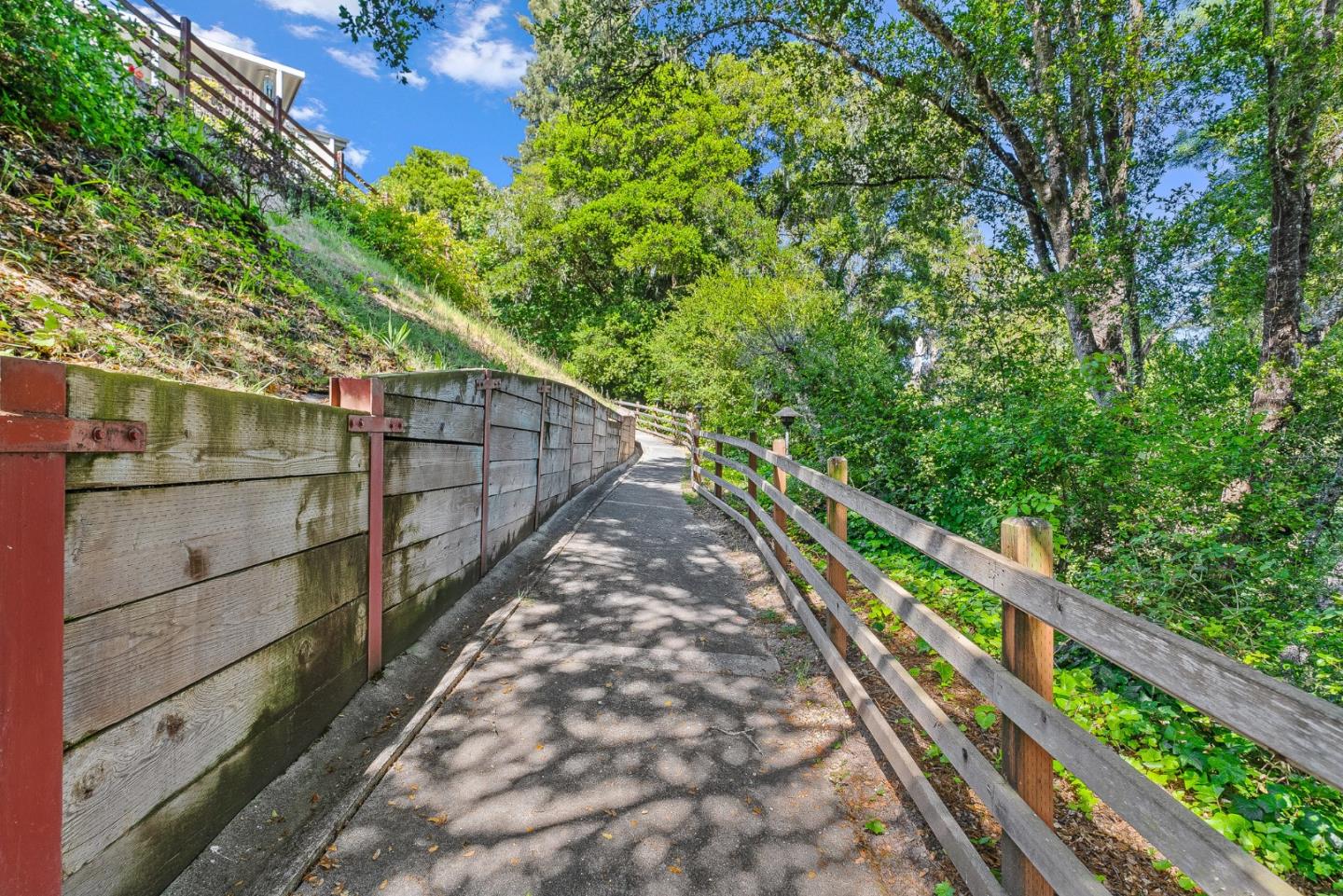 15 Oak Shadows Lane, Unit 15 Aptos, CA 95003 - Photo 39 of 56 a view of a balcony with a pot