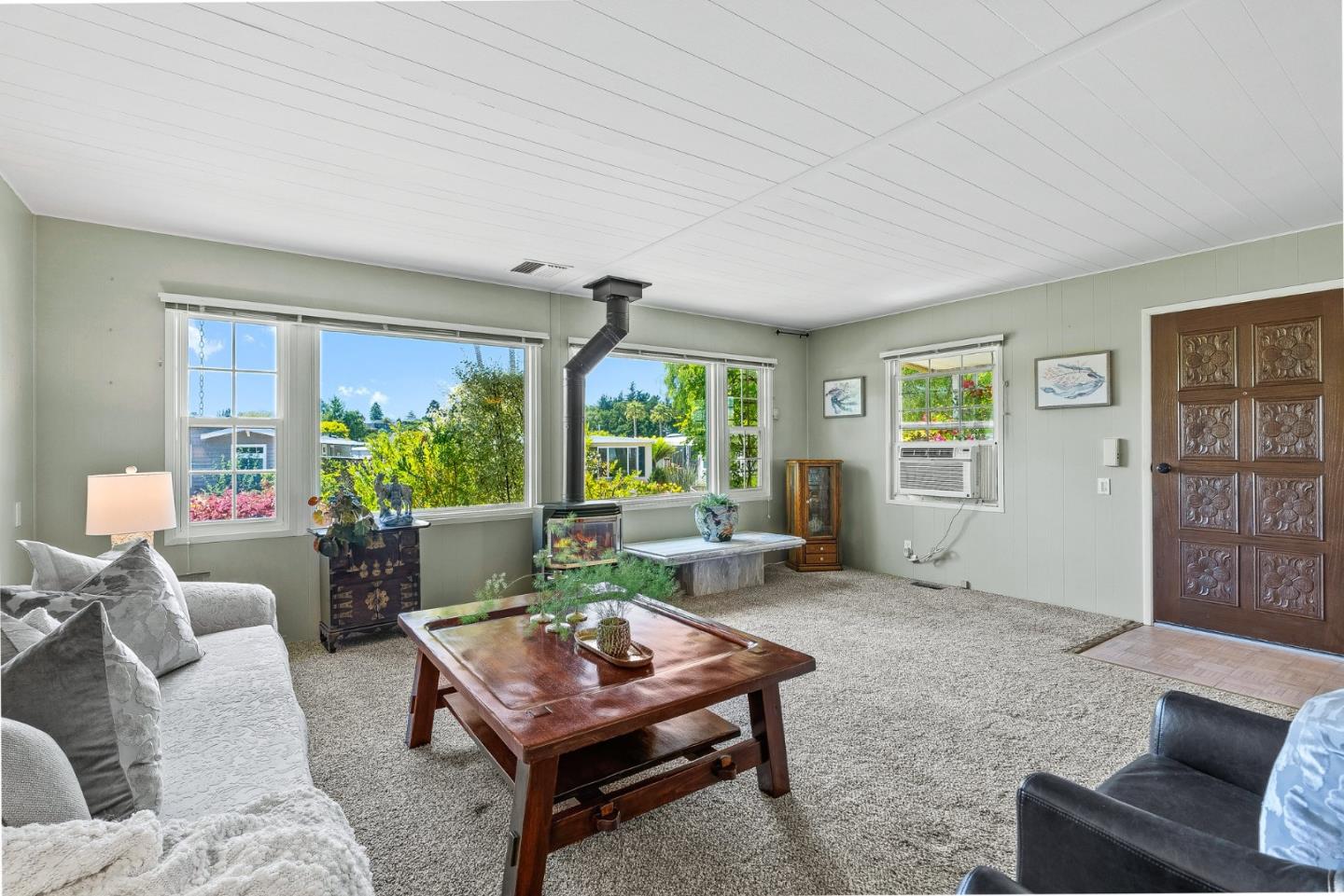 15 Oak Shadows Lane, Unit 15 Aptos, CA 95003 - Photo 6 of 56 a living room with furniture and a window