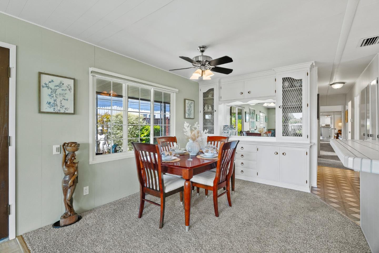 15 Oak Shadows Lane, Unit 15 Aptos, CA 95003 - Photo 8 of 56 a view of a dining room with furniture window and outside view