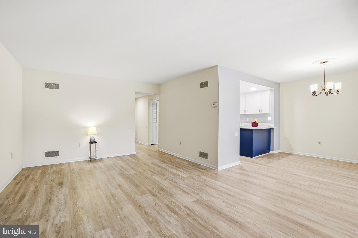 3362 Gleneagles Drive, Unit 711D Silver Spring, MD 20906 - Photo 17 of 26 Expansive Living and Dining area