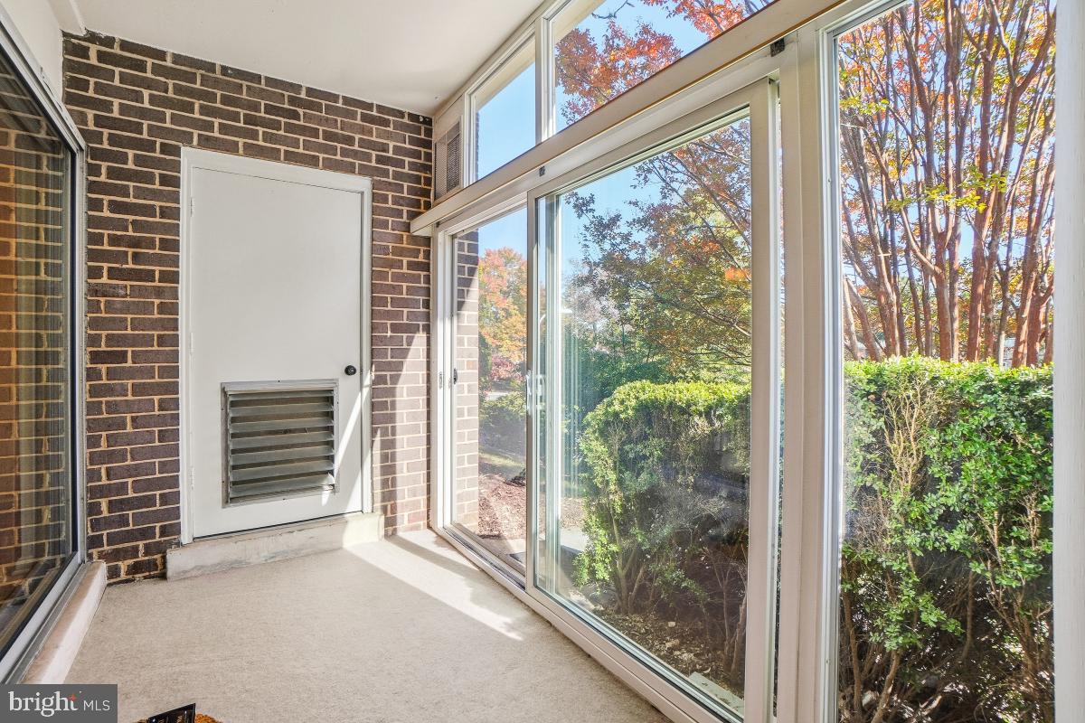 3362 Gleneagles Drive, Unit 711D Silver Spring, MD 20906 - Photo 4 of 26 a view of a room that has a large window