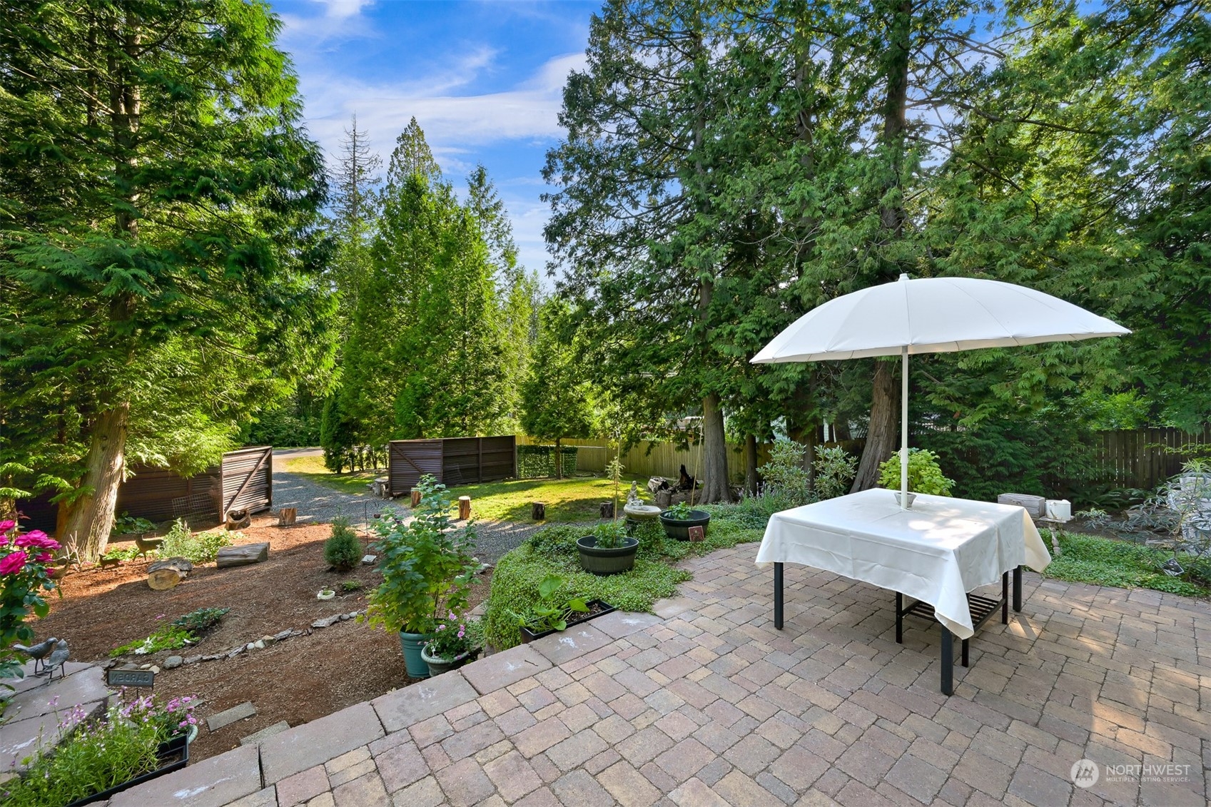 4298 Masterson Road Blaine, WA 98230 - Photo 16 of 31 a garden view with a seating space