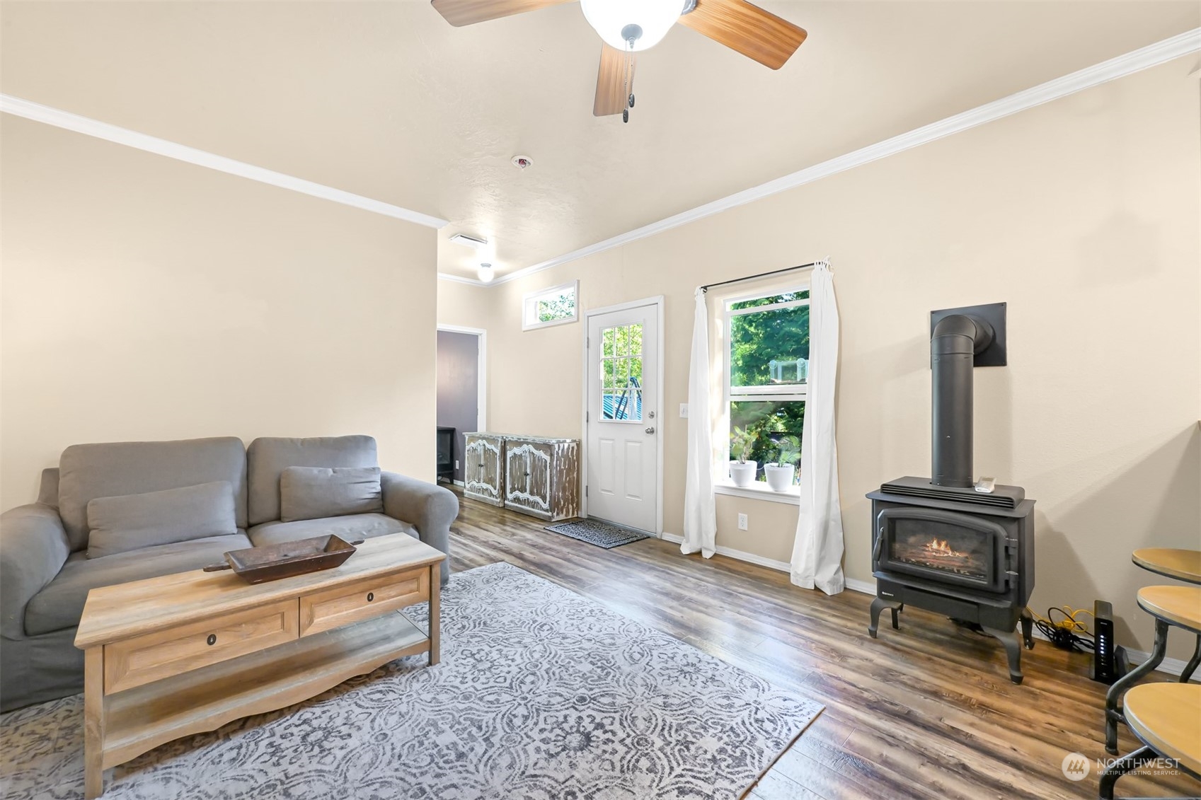 4298 Masterson Road Blaine, WA 98230 - Photo 5 of 31 a living room with furniture and a fireplace