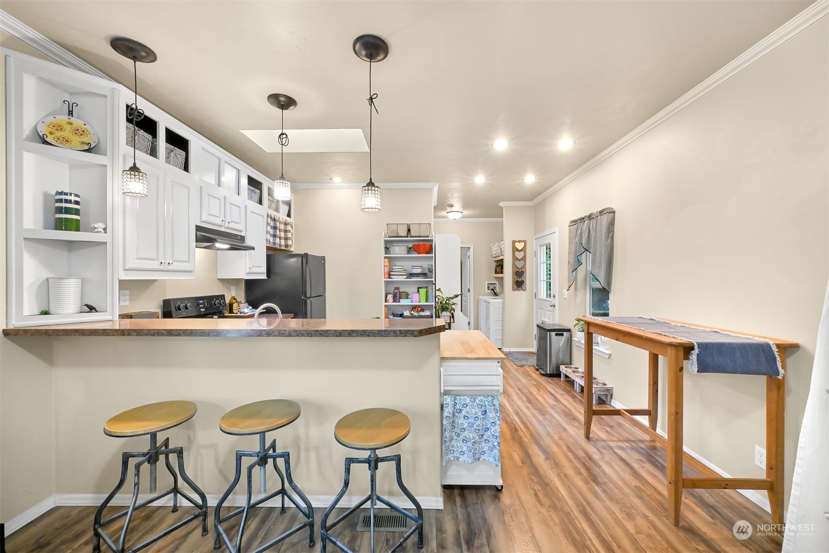 4298 Masterson Road Blaine, WA 98230 - Photo 7 of 31 a large kitchen with a table and chairs