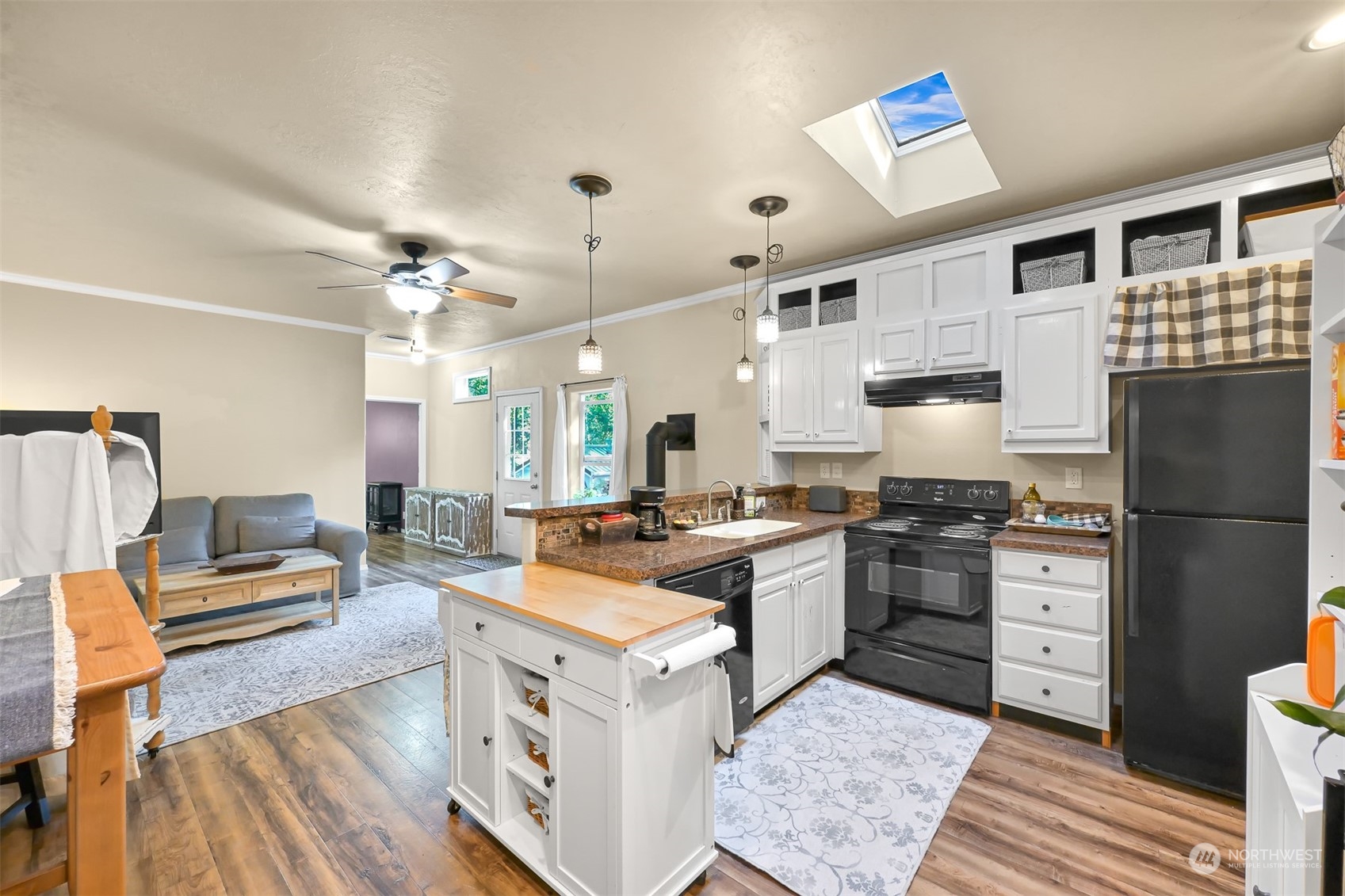4298 Masterson Road Blaine, WA 98230 - Photo 8 of 31 a kitchen with stainless steel appliances granite countertop a stove refrigerator and cabinets