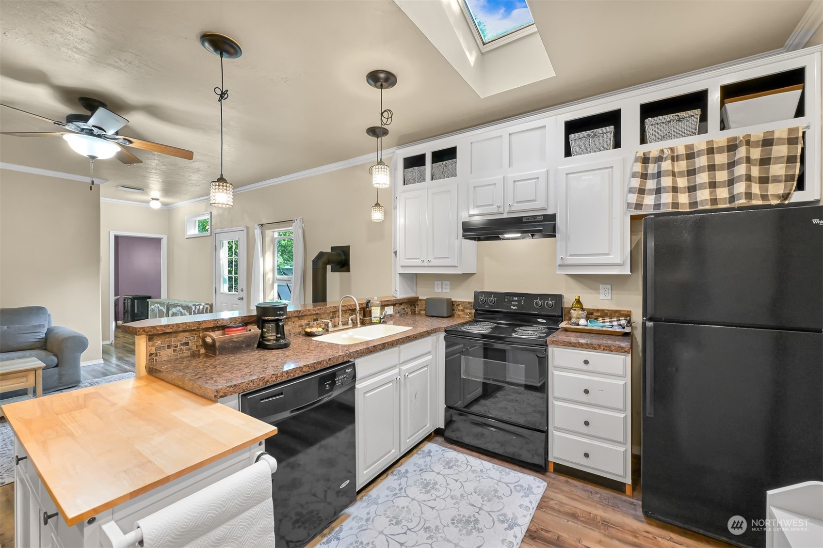 4298 Masterson Road Blaine, WA 98230 - Photo 10 of 31 a kitchen with stainless steel appliances granite countertop a sink stove and refrigerator