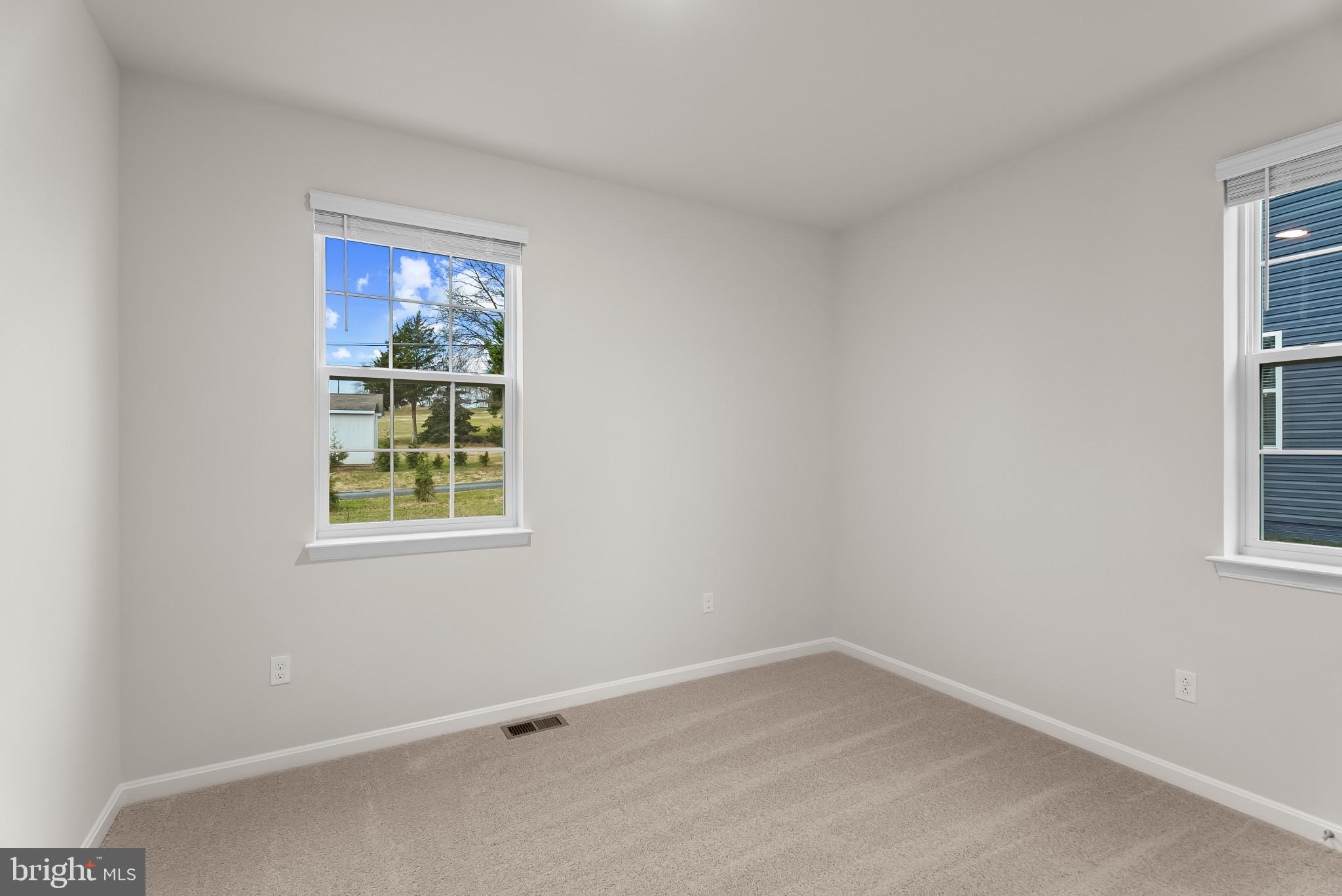 5 Comes Rdg Court Rosedale, MD 21237 - Photo 11 of 48 an empty room with windows