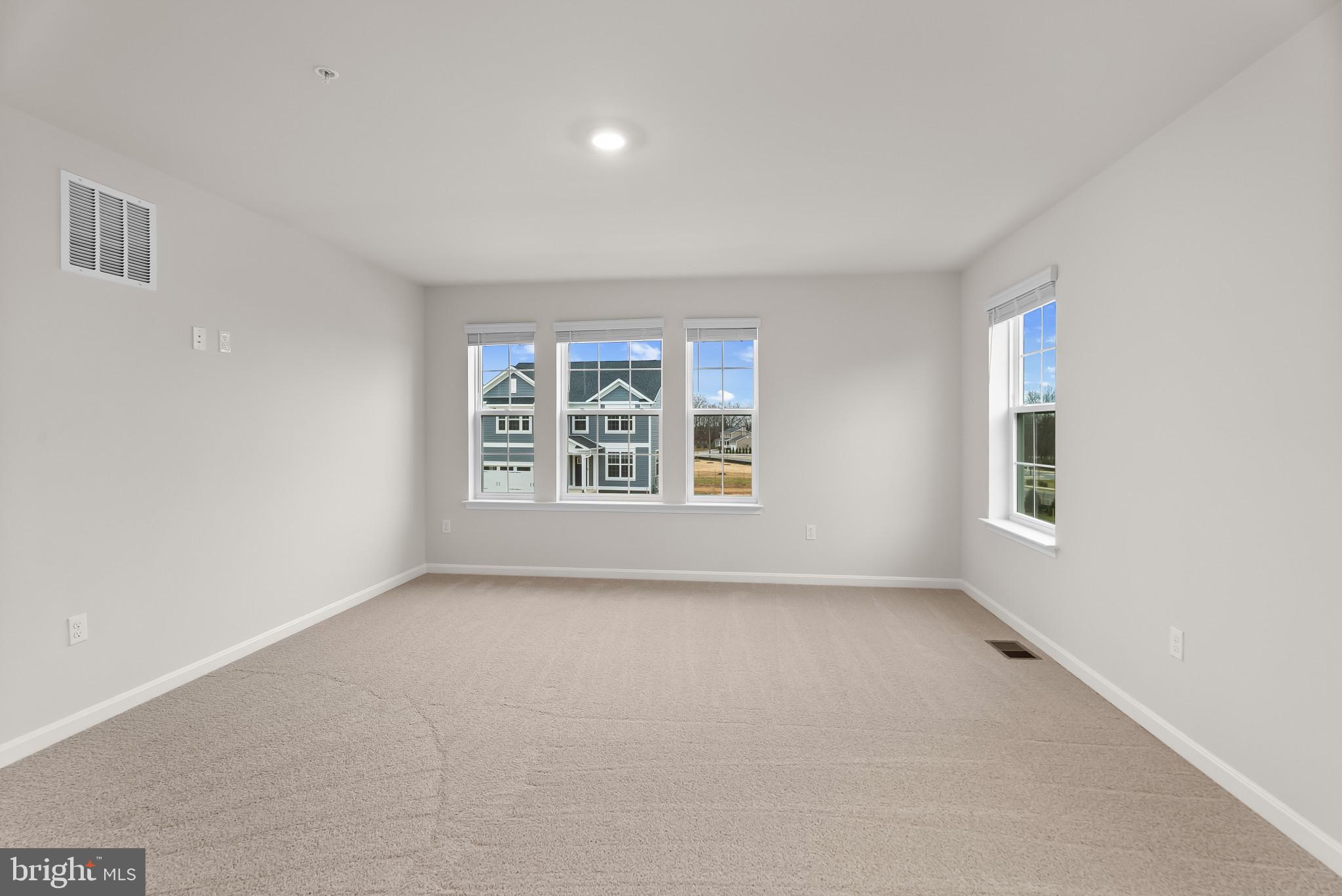 5 Comes Rdg Court Rosedale, MD 21237 - Photo 18 of 48 an empty room with windows