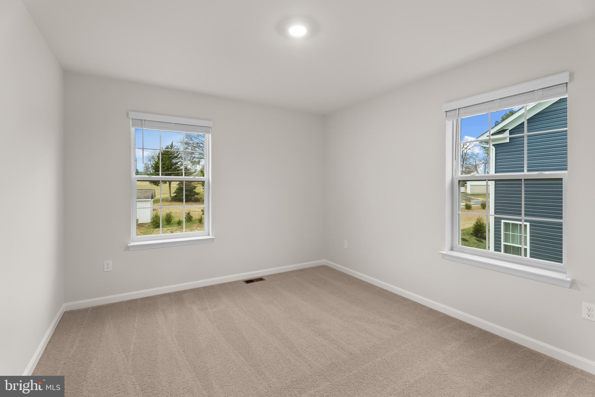 5 Comes Rdg Court Rosedale, MD 21237 - Photo 22 of 48 an empty room with a window