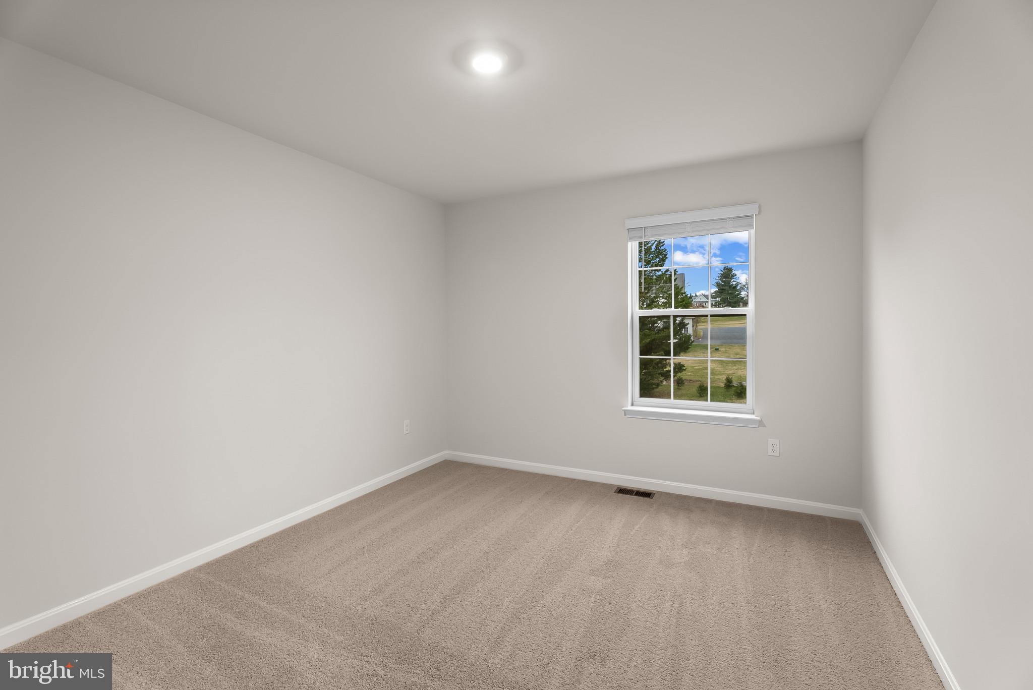 5 Comes Rdg Court Rosedale, MD 21237 - Photo 23 of 48 an empty room with a window