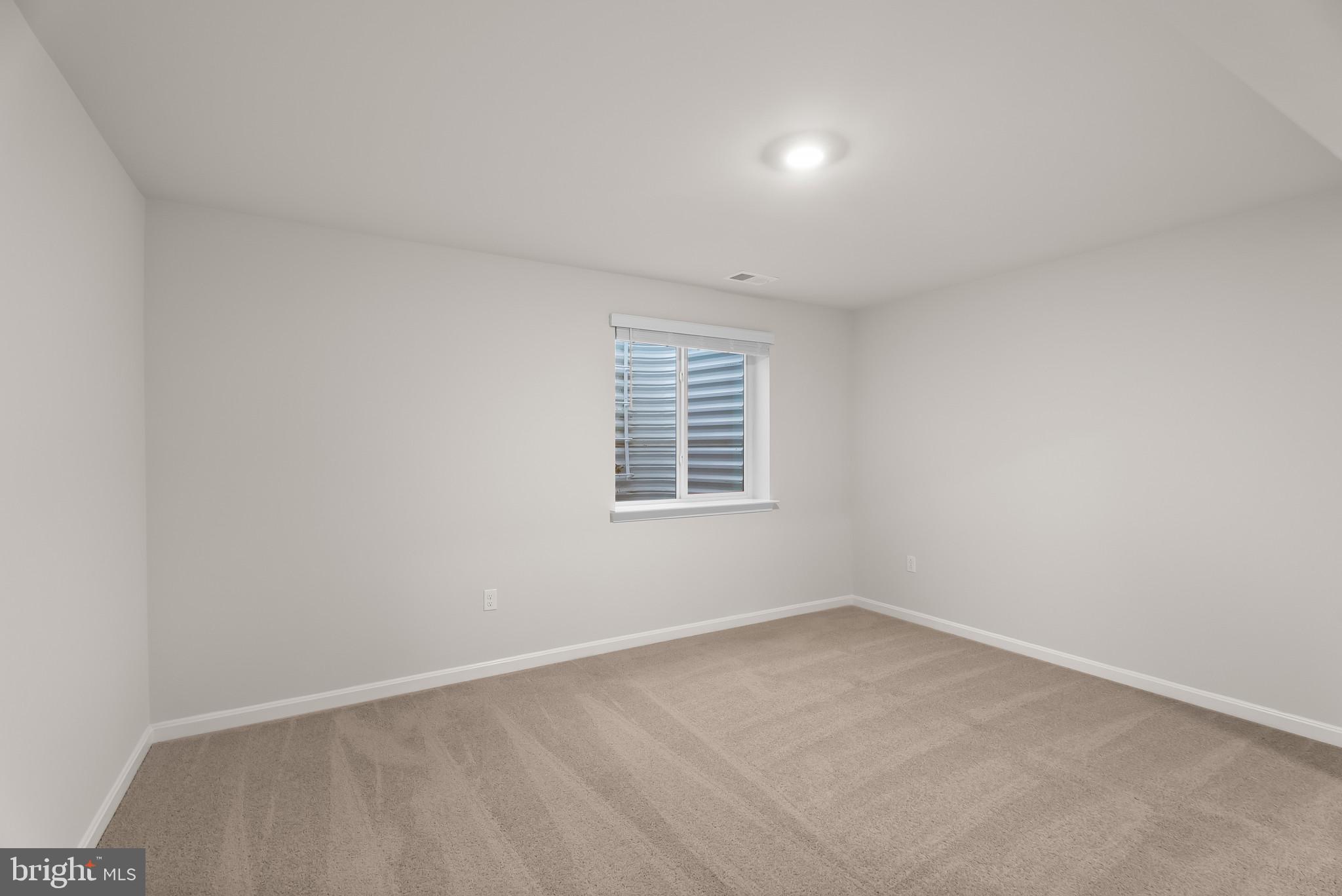 5 Comes Rdg Court Rosedale, MD 21237 - Photo 29 of 48 an empty room with a window