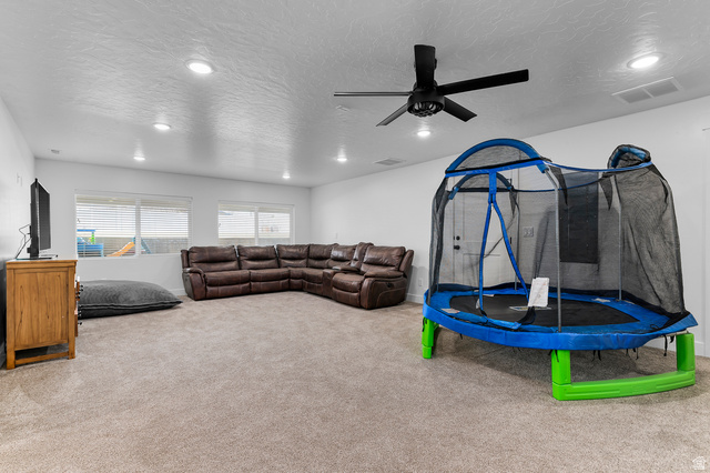 1426 South 1450th Street West Mapleton, UT 84664 - Photo 26 of 50 Spacious room featuring neutral carpet flooring, recessed lighting, and a ceiling fan