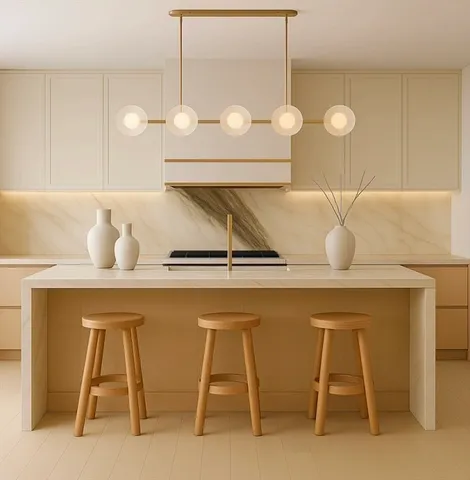 a kitchen with a sink cabinets and chair