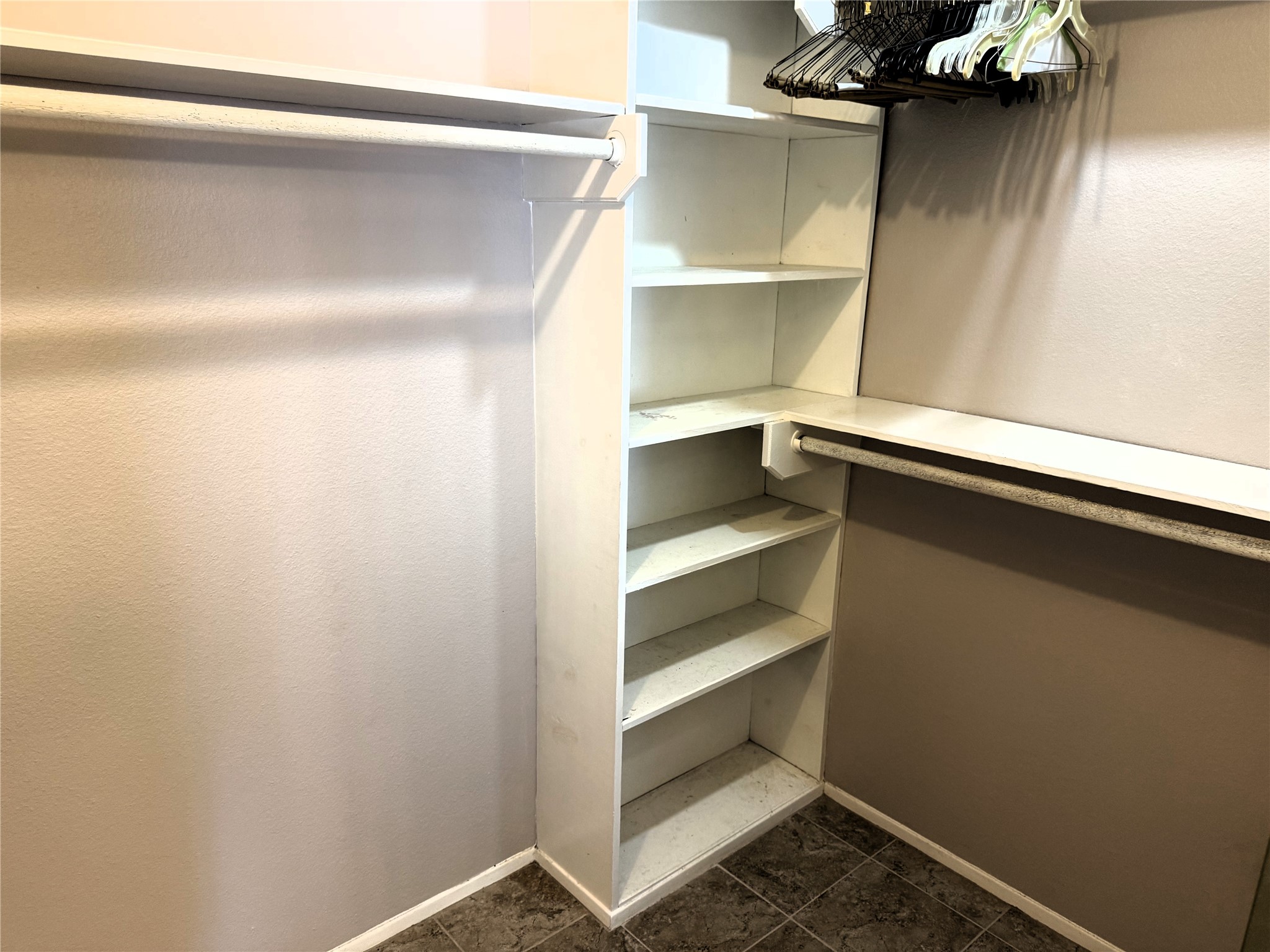 62 Evanston Street, Unit 2/5 Houston, TX 77015 - Photo 17 of 24 a view of walk in closet with empty racks