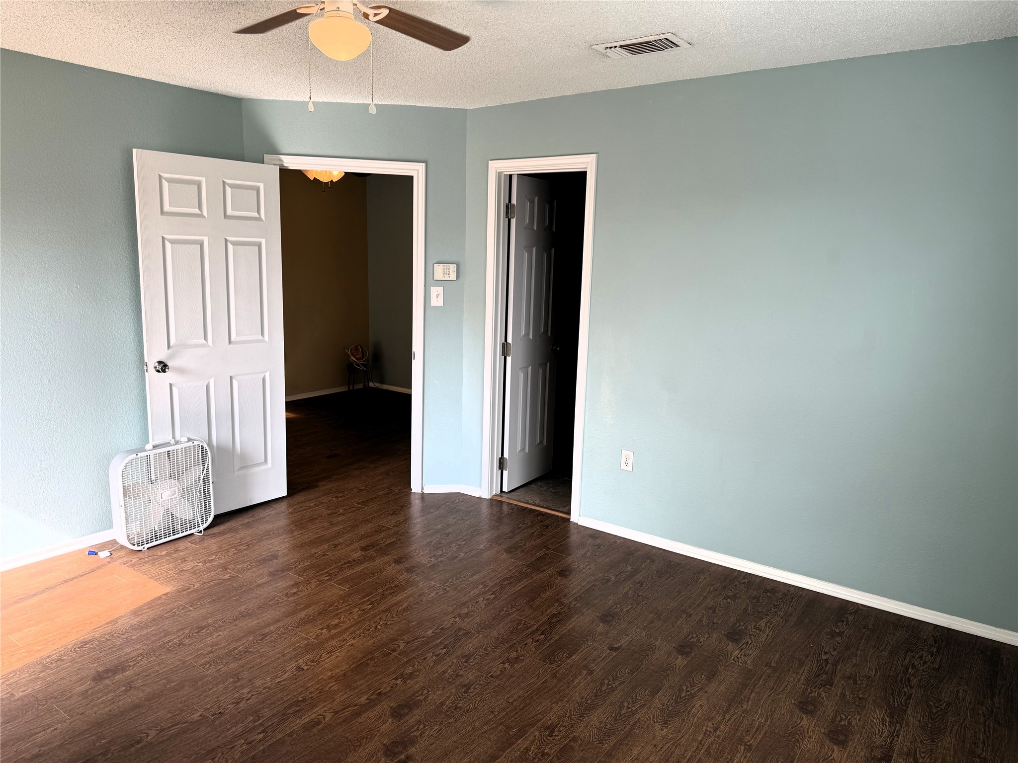 62 Evanston Street, Unit 2/5 Houston, TX 77015 - Photo 18 of 24 an empty room with wooden floor and closet