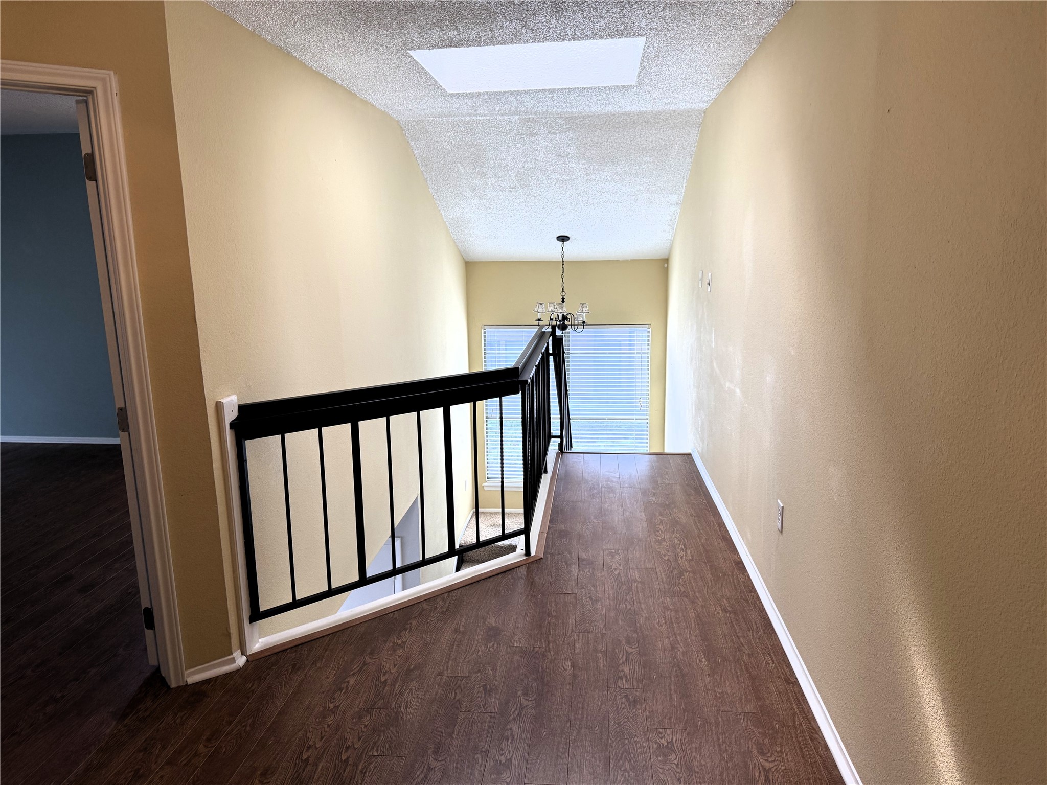 62 Evanston Street, Unit 2/5 Houston, TX 77015 - Photo 10 of 24 a view of a hallway with wooden floor