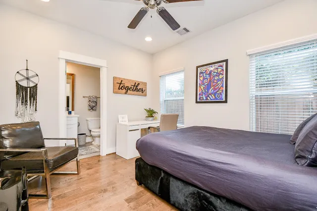 a bedroom with a bed and furniture