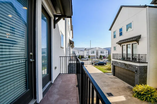 a view of a kitchen from a balcony