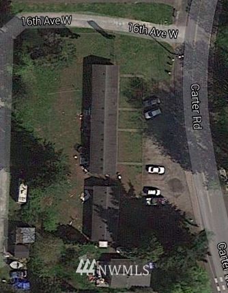 24322 Carter Road Bothell, WA 98021 - Photo 2 of 3 an aerial view of a residential building with outdoor space