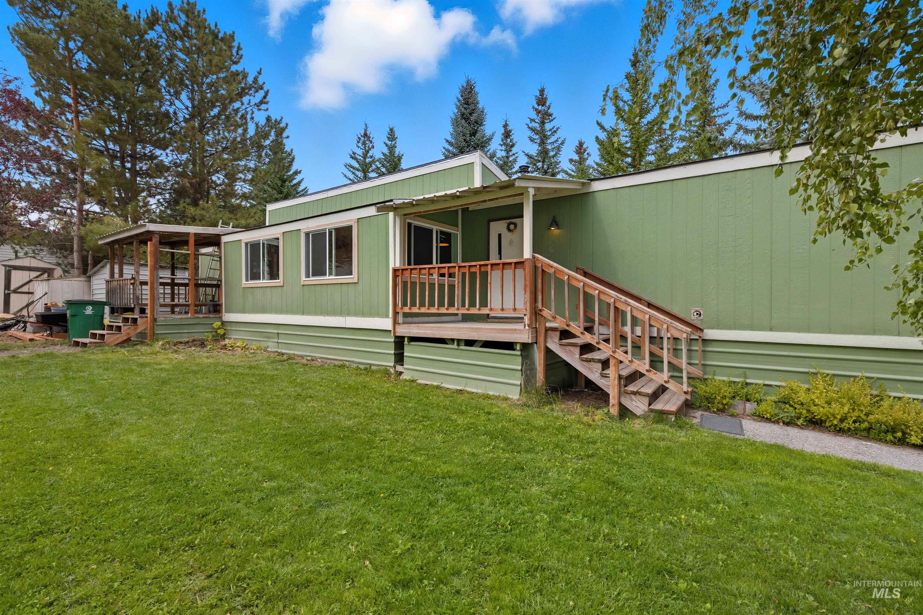 609 North Almon Street, Unit 2003 Moscow, ID 83843 - Photo 2 of 18 View of front of home featuring a front yard and stairs