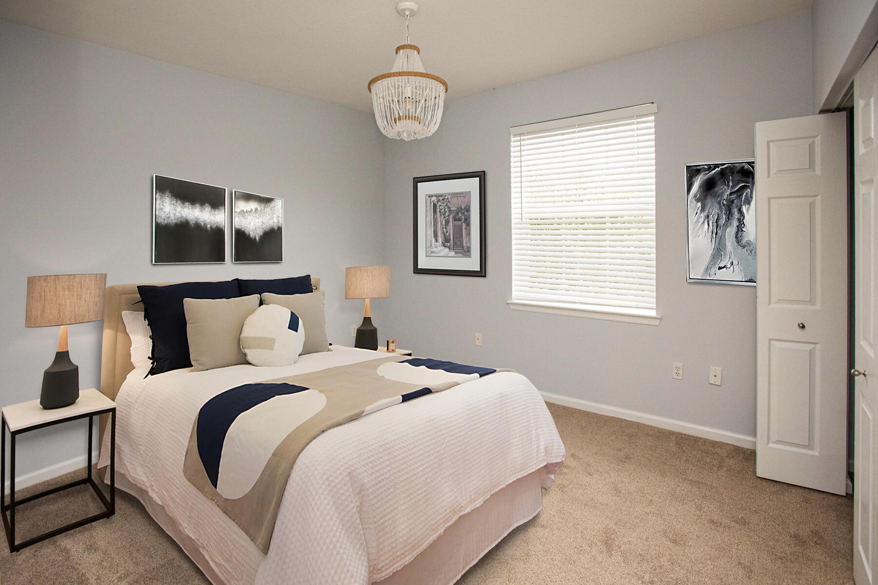 175 Galicia Way, Unit 210 Jupiter, FL 33458 - Photo 15 of 17 a bedroom with bed and a window