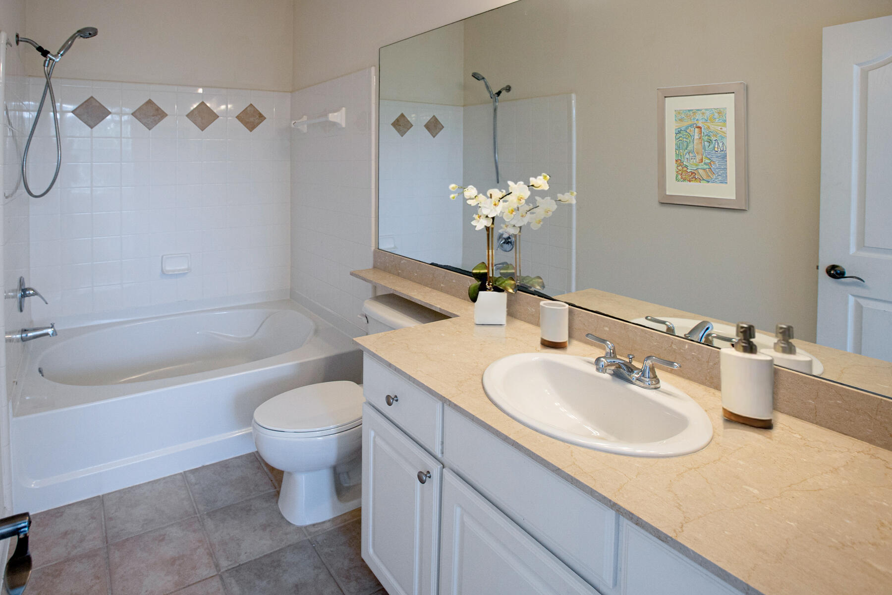 175 Galicia Way, Unit 210 Jupiter, FL 33458 - Photo 16 of 17 a bathroom with a sink toilet tub and shower