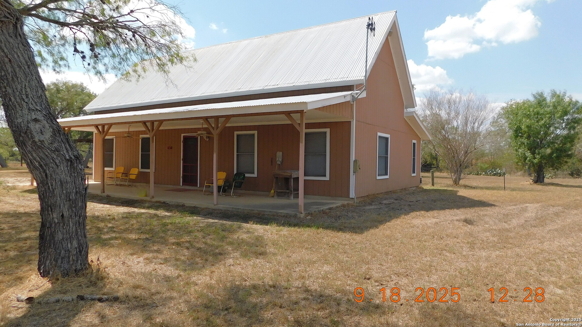 3 Gansky Lane Pleasanton, TX 78064 - Photo 29 of 45 a view of a house with backyard porch and garden