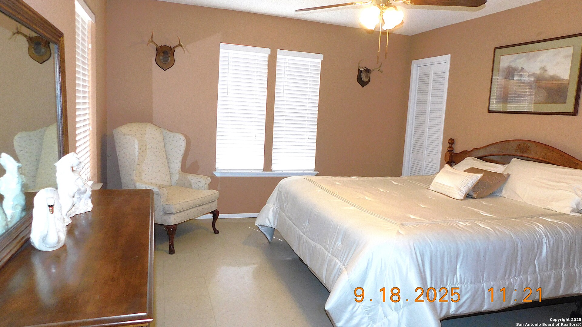 3 Gansky Lane Pleasanton, TX 78064 - Photo 40 of 45 a bedroom with a bed and a chair