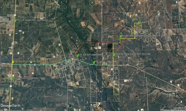 a view of a yard with large trees