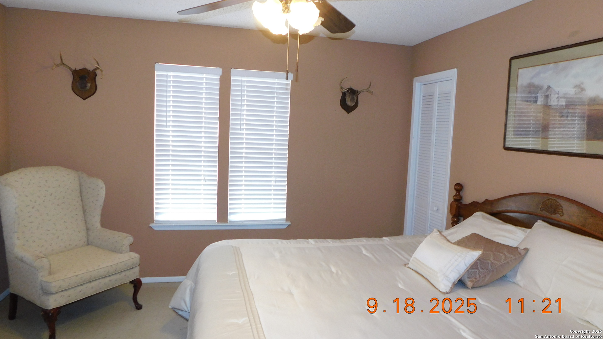 3 Gansky Lane Pleasanton, TX 78064 - Photo 41 of 45 a bedroom with a bed and a chair