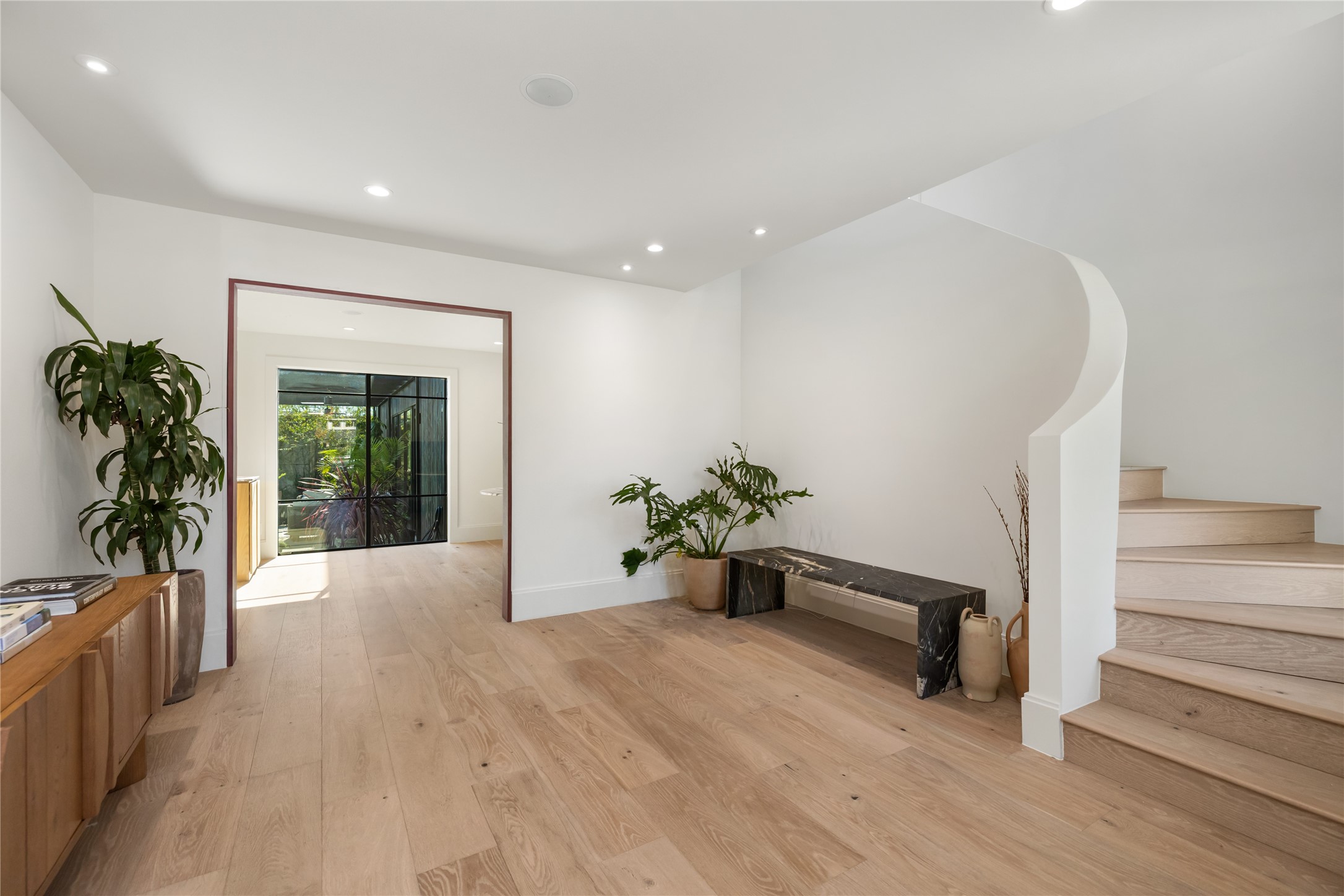 419 West 30th Street Houston, TX 77018 - Photo 5 of 45 a view of an entryway with wooden floor and a rug