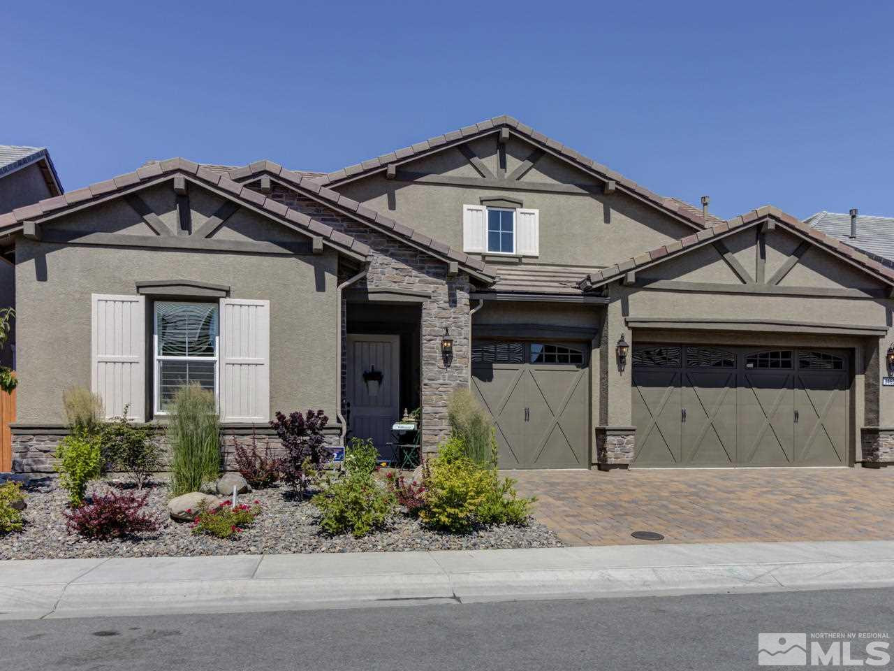 9465 Baldacci Road Reno, NV 89521 - Photo 1 of 25 a front view of a house with a yard