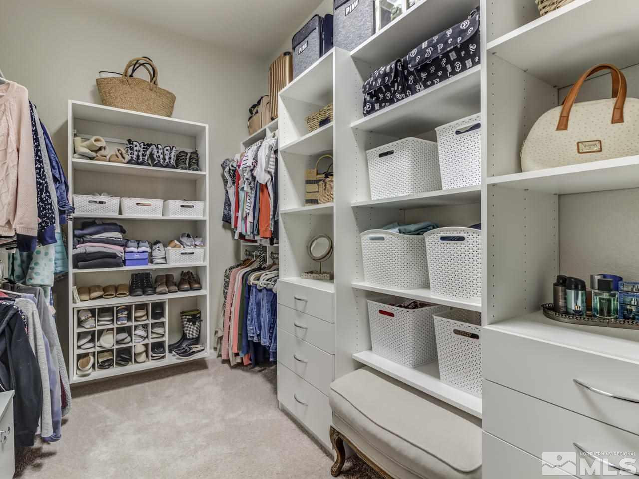 9465 Baldacci Road Reno, NV 89521 - Photo 15 of 25 a view of walk in closet with clothes and shoes