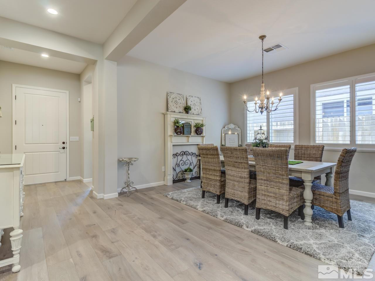 9465 Baldacci Road Reno, NV 89521 - Photo 2 of 25 a view of a livingroom with furniture window and wooden floor