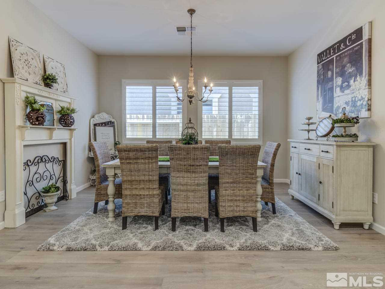 9465 Baldacci Road Reno, NV 89521 - Photo 3 of 25 a view of a dining room with furniture window and wooden floor