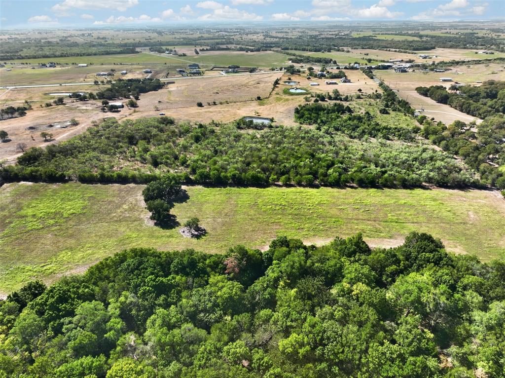 0 Novy Road Ennis, TX 75119 - Photo 8 of 25 Expansive rural landscape featuring wooded areas and open fields