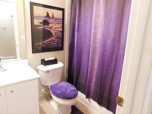 a view of a bathroom with a sink and toilet
