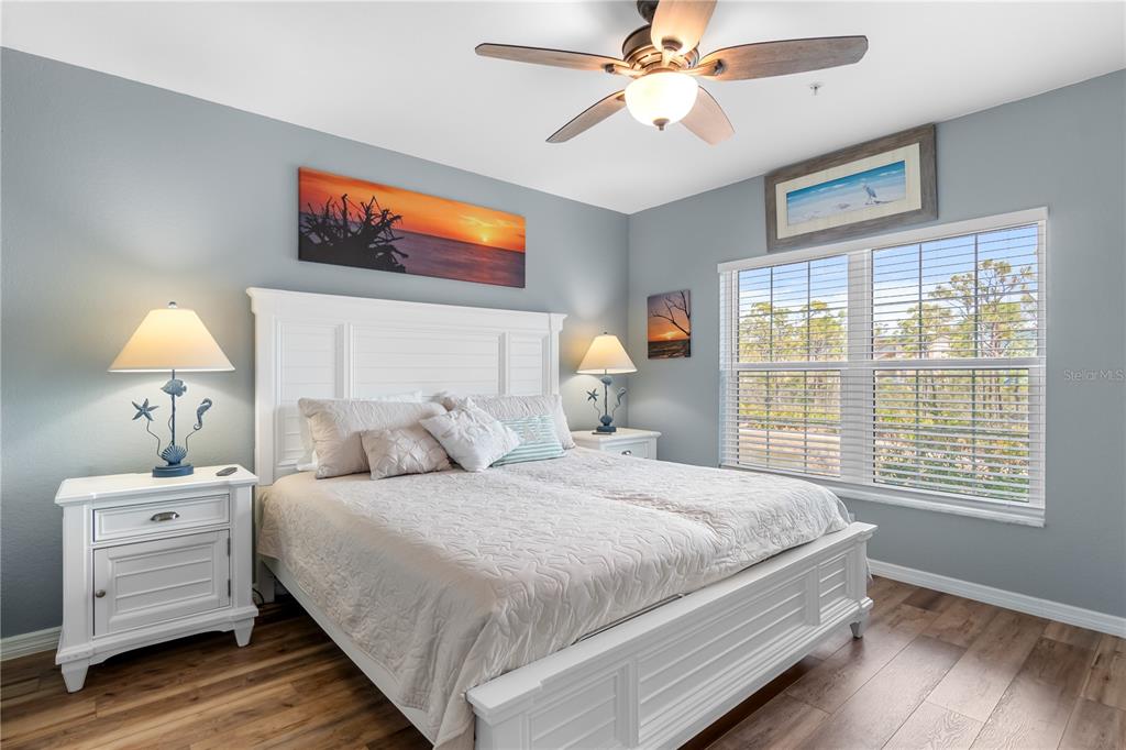 8405 Placida Road, Unit 206 Placida, FL 33946 - Photo 24 of 44 a bedroom with bed and a window