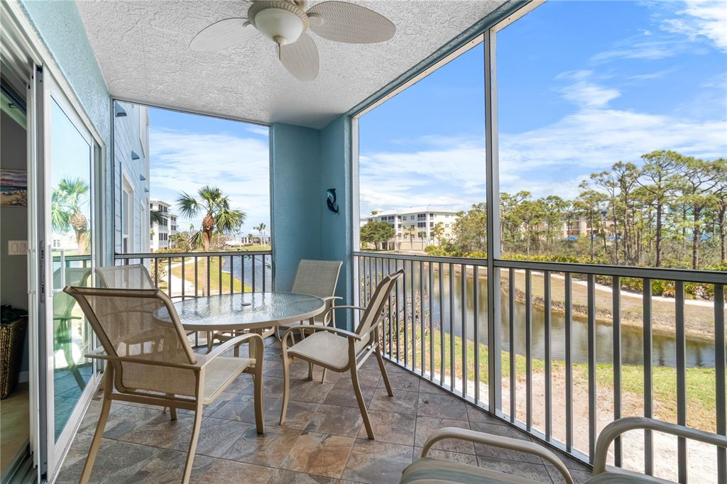 8405 Placida Road, Unit 206 Placida, FL 33946 - Photo 32 of 44 a view of a city from a balcony