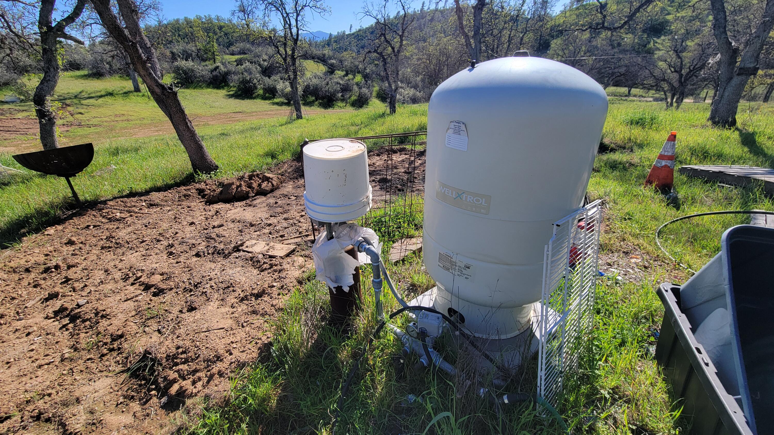Lot 207 Fiddlers Road Igo, CA 96047 - Photo 19 of 26 a view of a yard with plants and a fountain