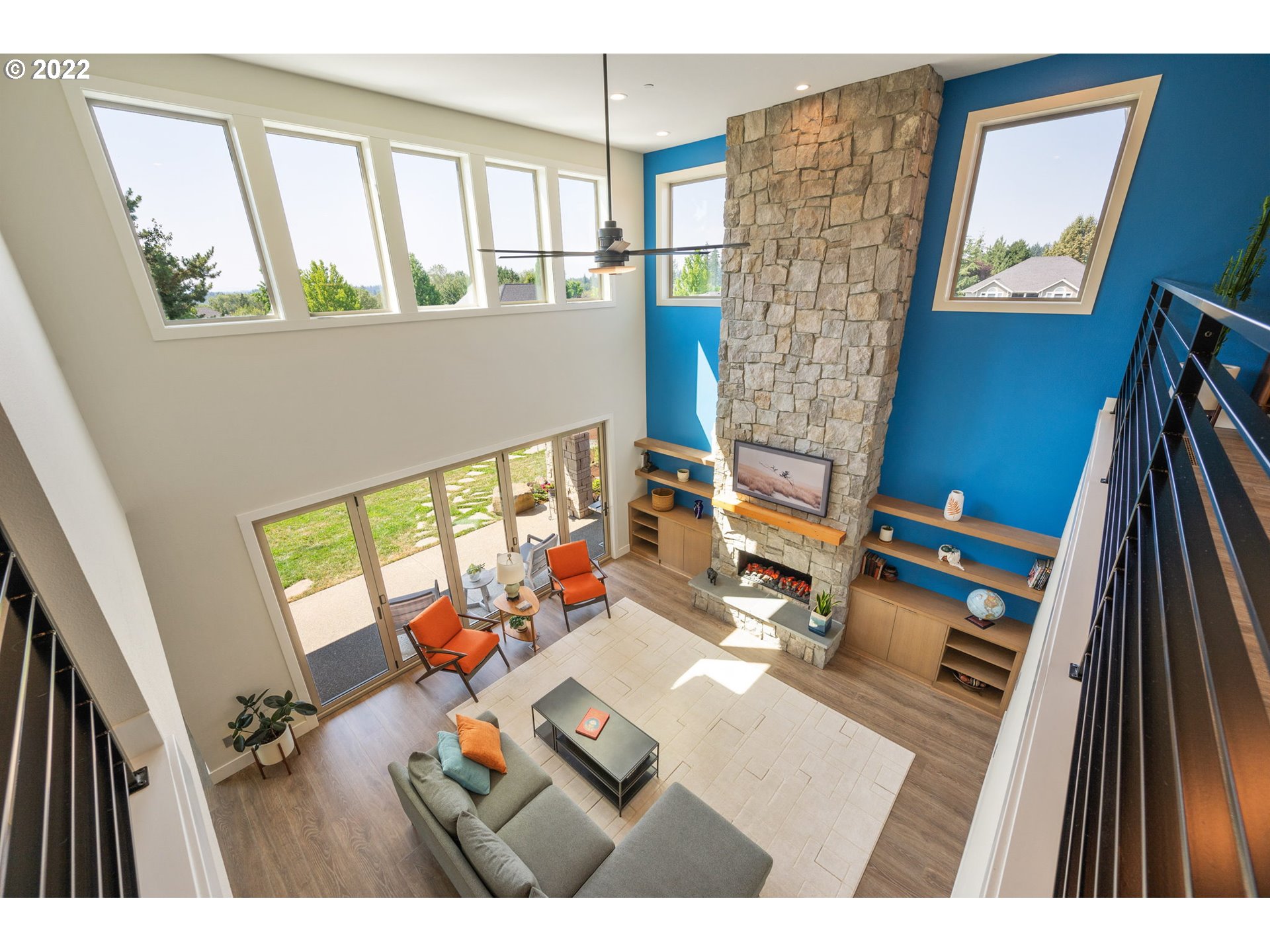 3865 Northwest Celebration Lane Camas, WA 98607 - Photo 15 of 32 a living room with furniture and a floor to ceiling window