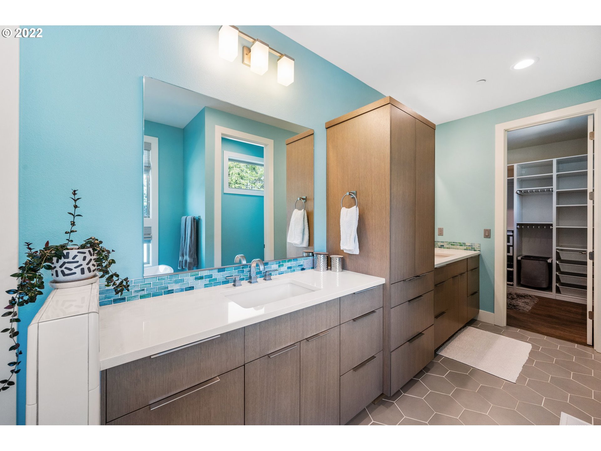3865 Northwest Celebration Lane Camas, WA 98607 - Photo 19 of 32 a bathroom with a sink and a mirror